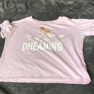 a pink Disney shirt sleeve crop top